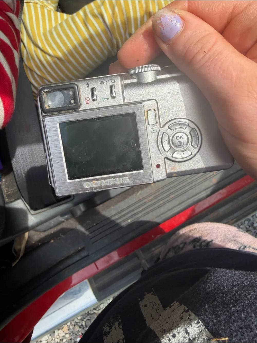 Olympus Silver Compact Slide-Lens Digital Camera works and comes with charger